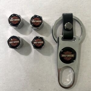 Four Harley Davidson chrome air valve caps